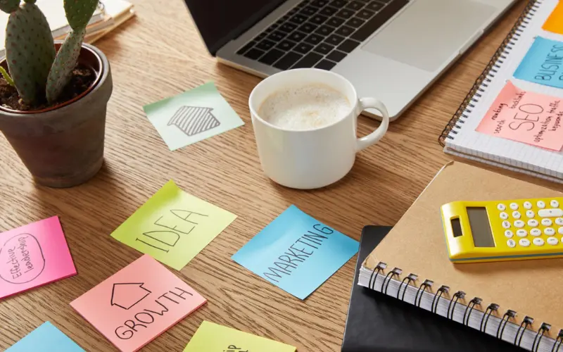 top 10 most successful businesses to start planning strategy workspace with marketing notes