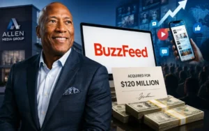 Byron Allen standing beside BuzzFeed branding after the $120 million BuzzFeed acquisition deal focused on AI, streaming, and digital media growth.